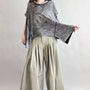 Trinity flowy oversized top in charcoal with relaxed fit and curved hem