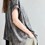 Side view of Trinity flowy oversized charcoal top showing relaxed drape