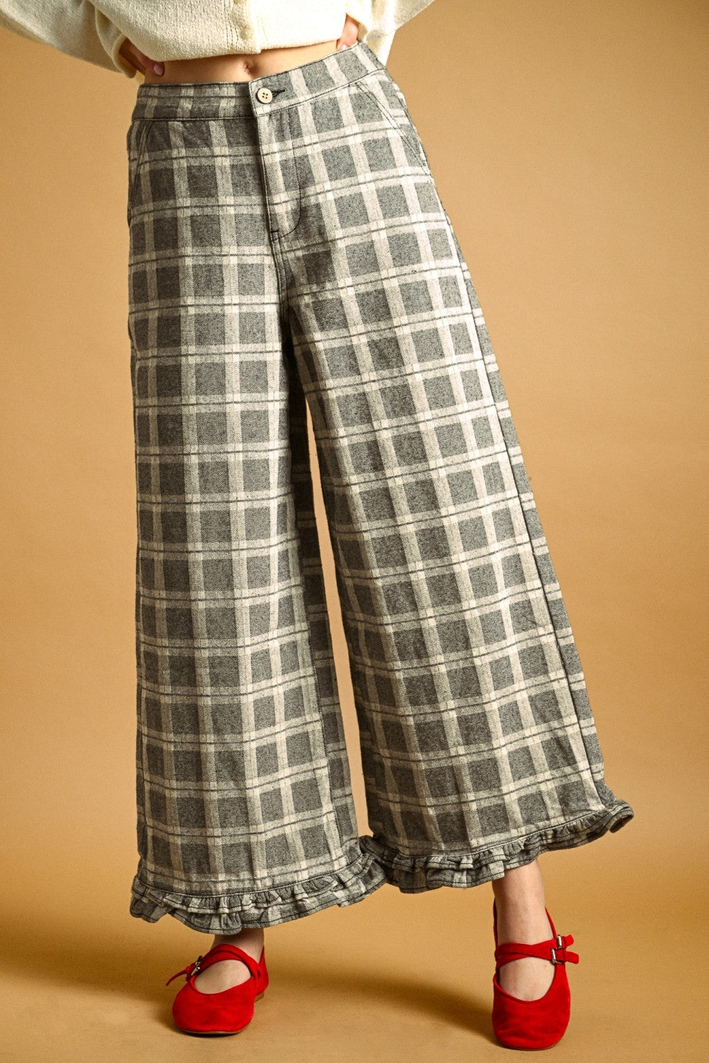 Front view of Trudy grey plaid wide-leg pants with ruffle hems
