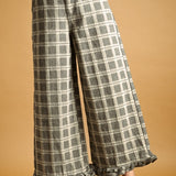 Front view of Trudy grey plaid wide-leg pants with ruffle hems