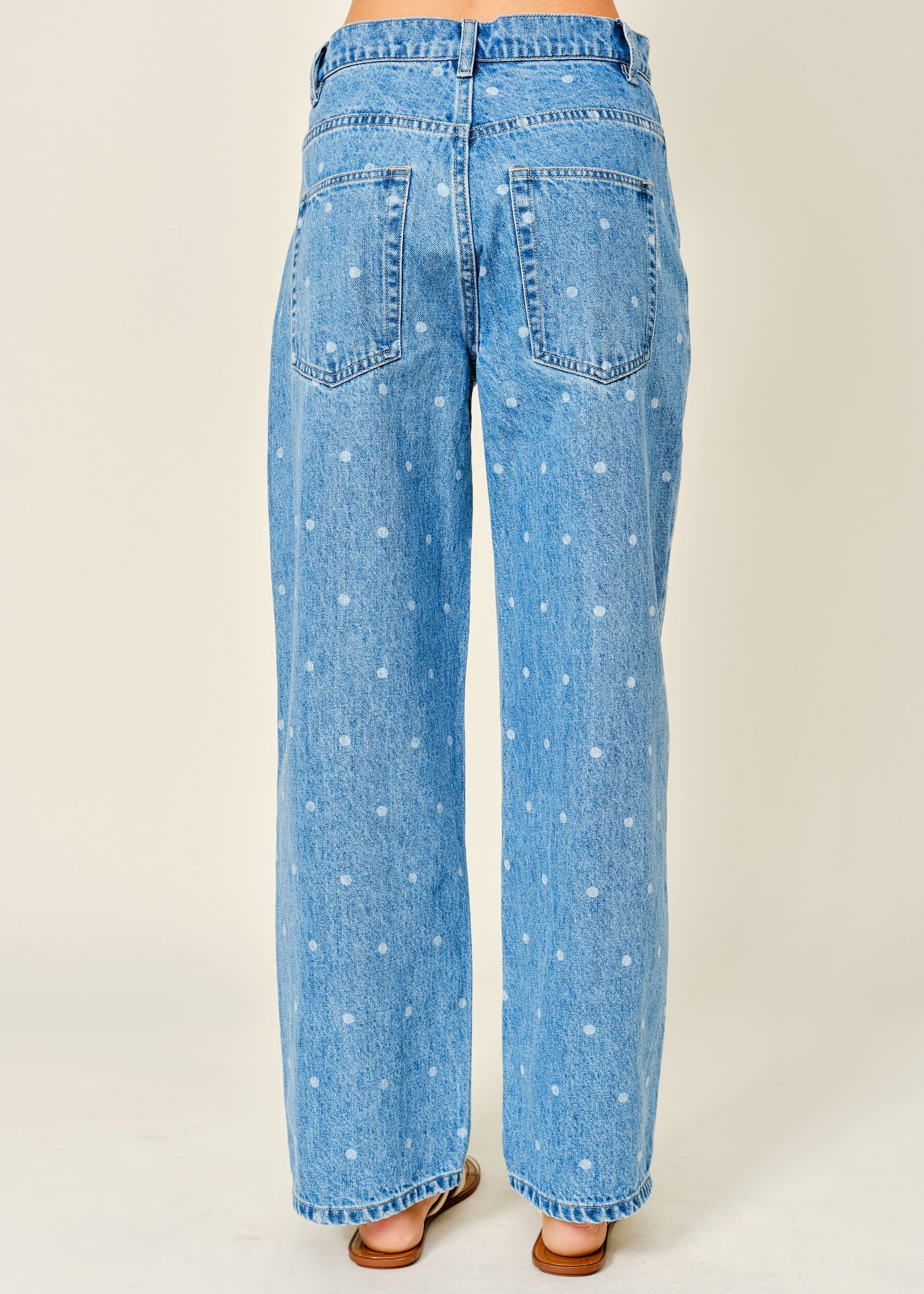 Back view of Truro High Rise Barrel Jeans in Denim Polka Dot with a high-rise waist and relaxed fit
