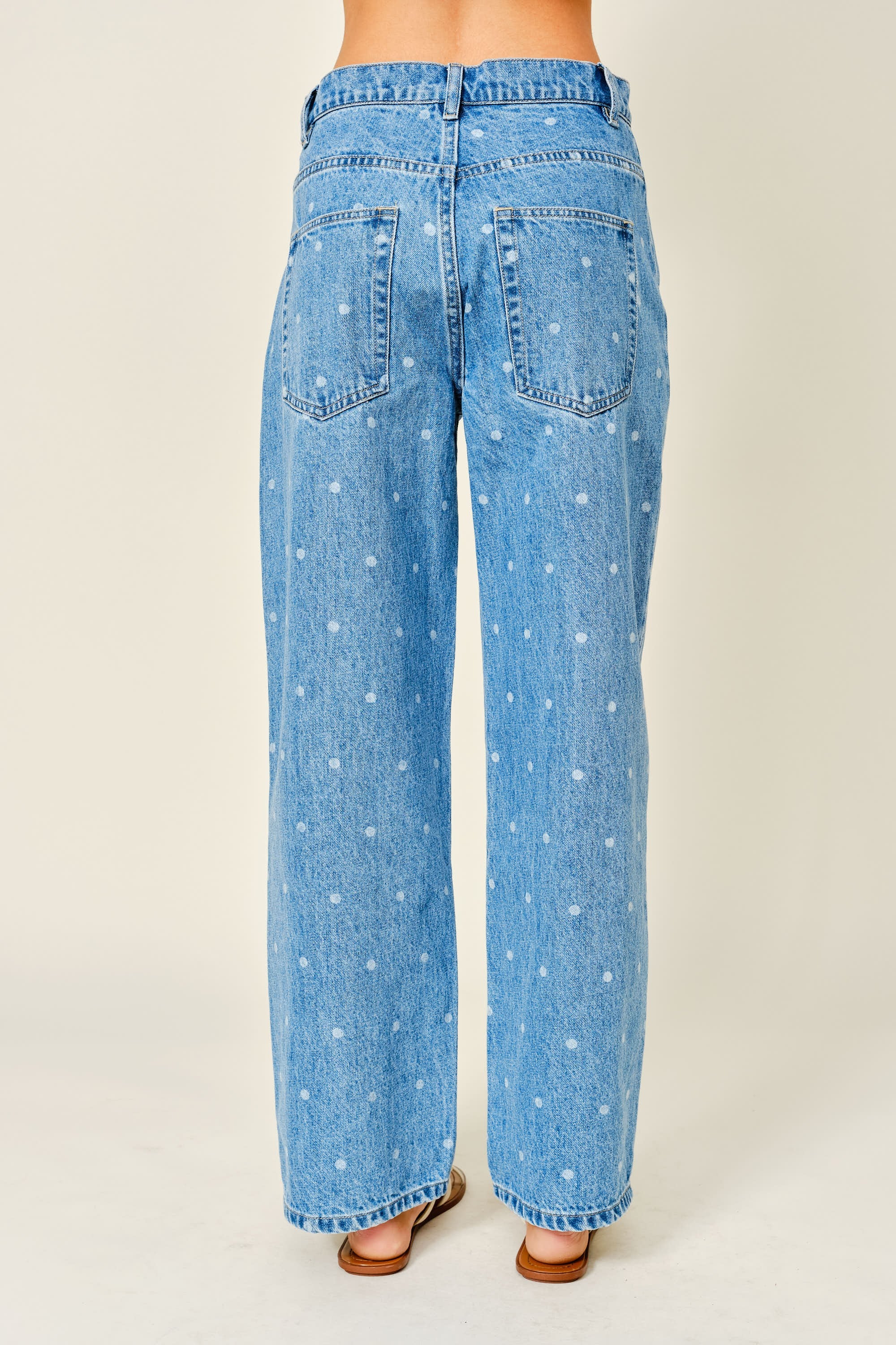 Back view of Truro High Rise Barrel Jeans in Denim Polka Dot with a high-rise waist and relaxed fit