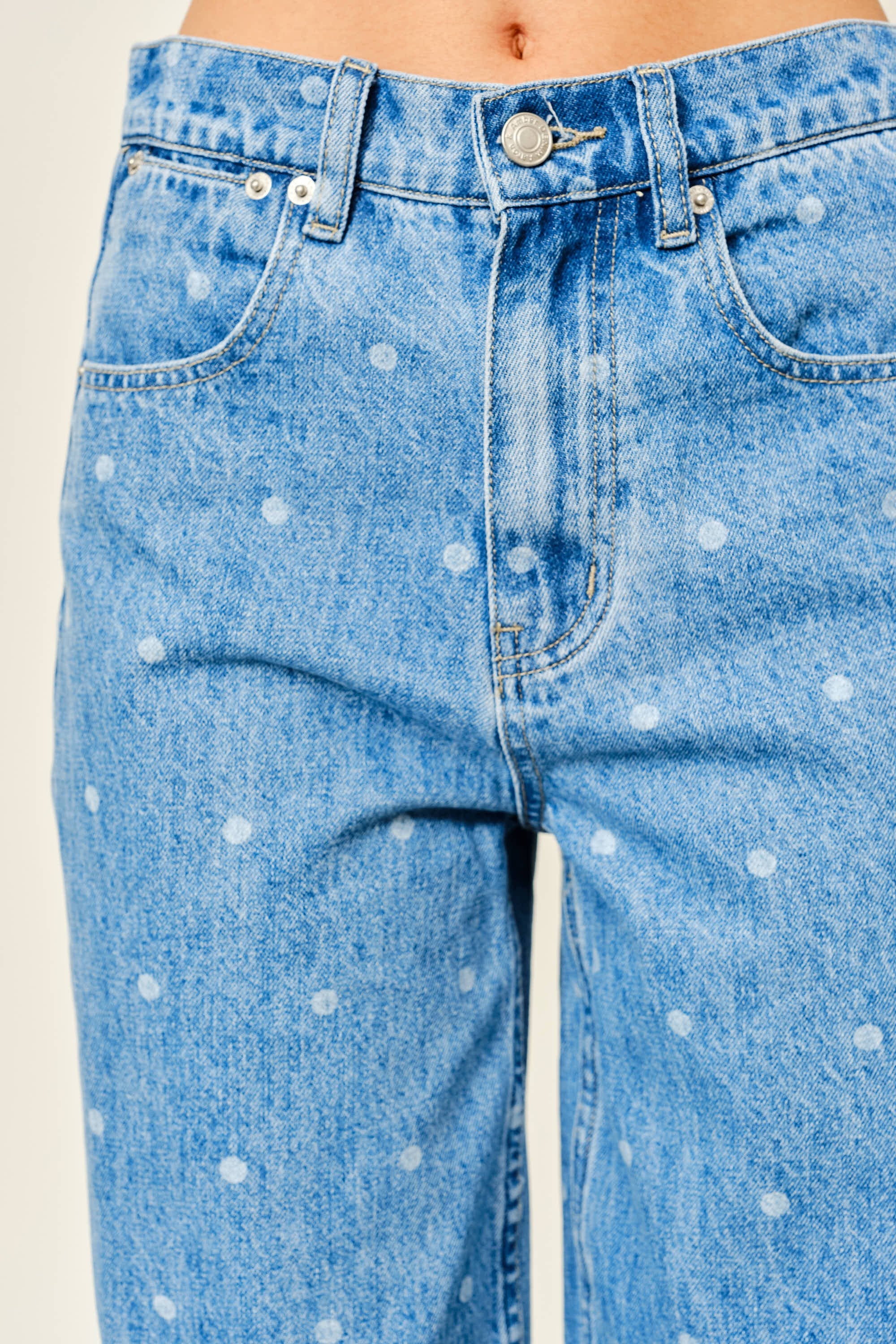 Close-up of Truro High Rise Barrel Jeans in Denim Polka Dot showing the denim fabric and polka dot print