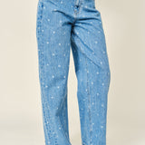 Side view of Truro High Rise Barrel Jeans in Denim Polka Dot featuring a softly tapered barrel leg