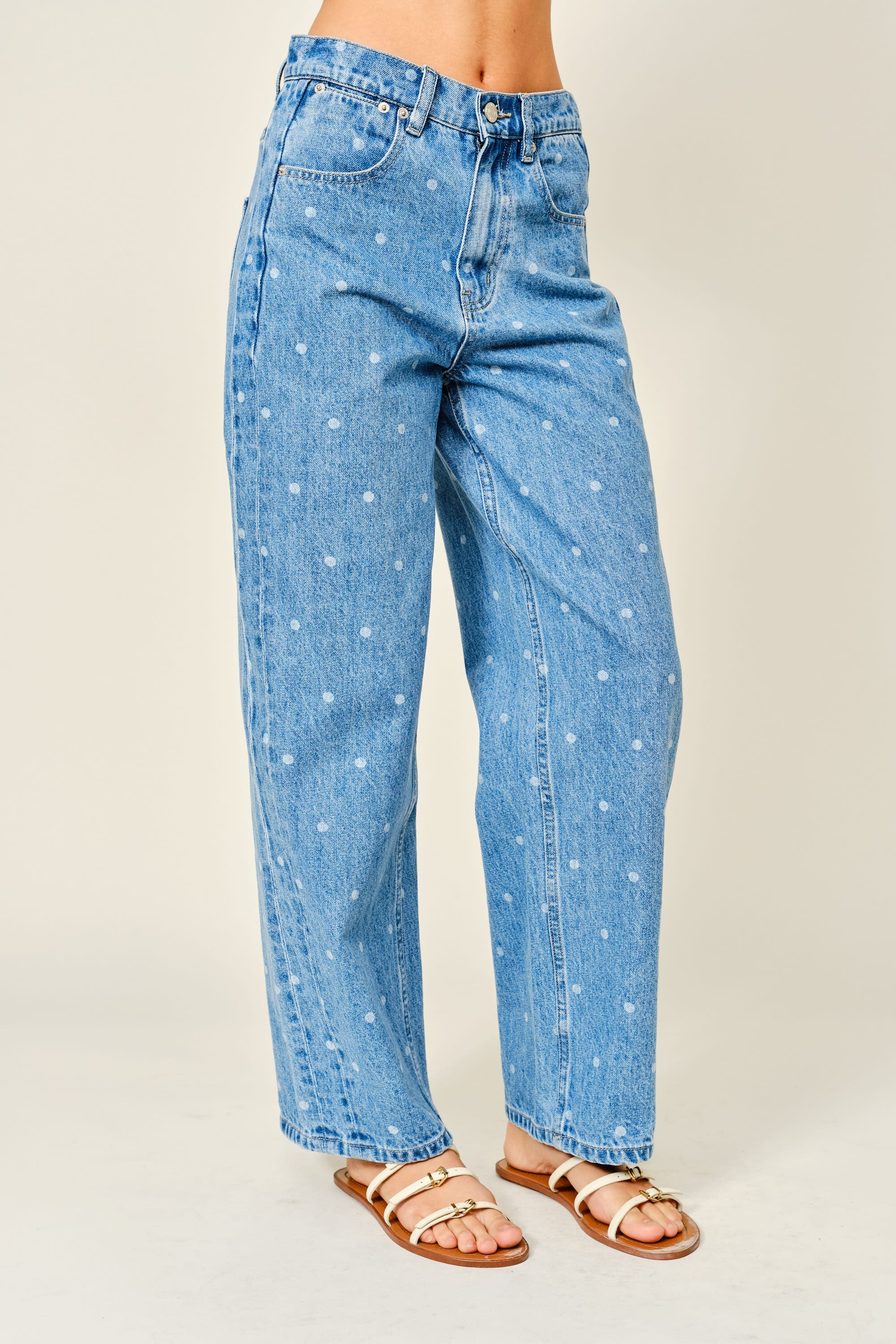 Side view of Truro High Rise Barrel Jeans in Denim Polka Dot featuring a softly tapered barrel leg