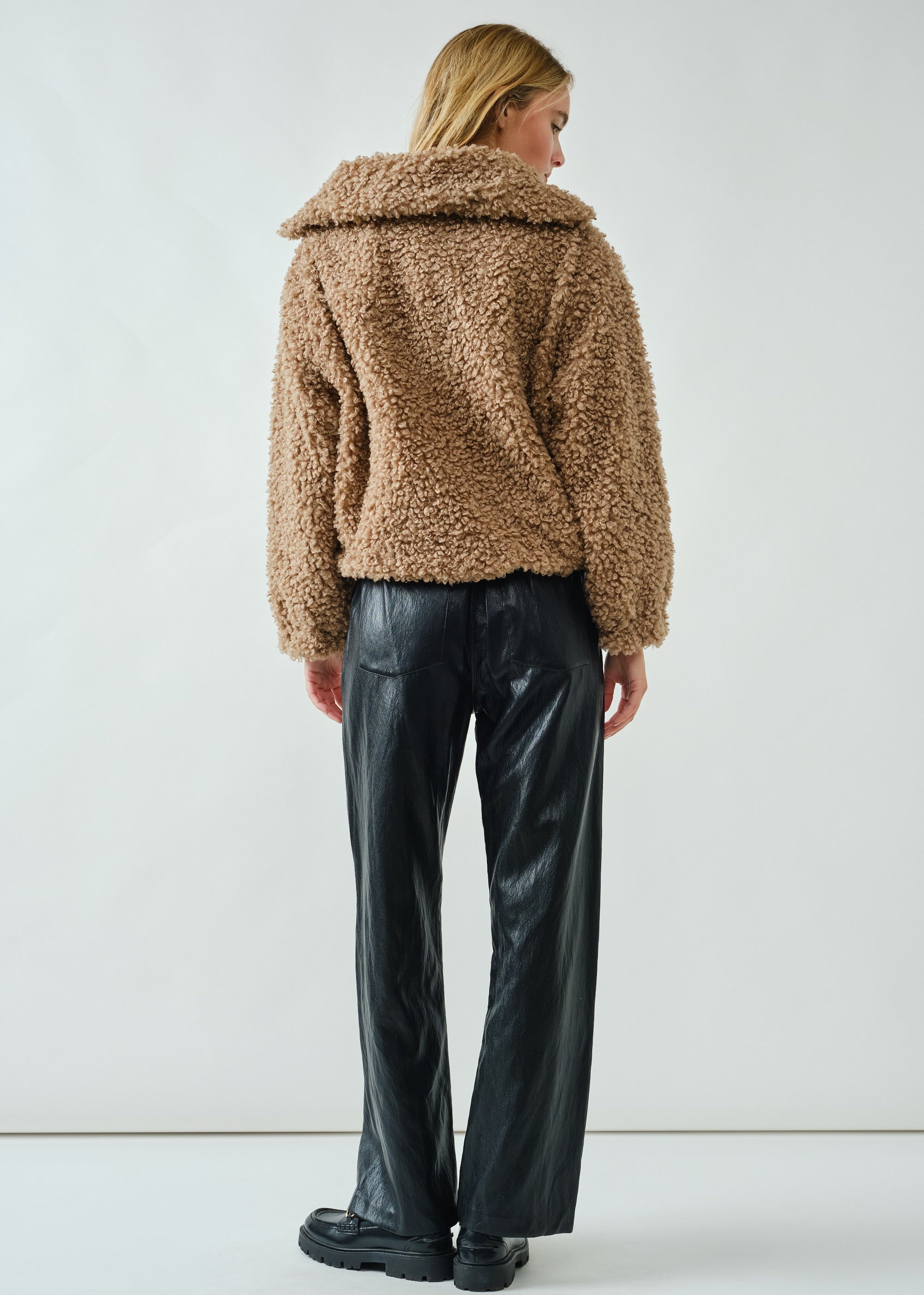 Back view of ultra soft half zip teddy jacket in taupe with relaxed silhouette