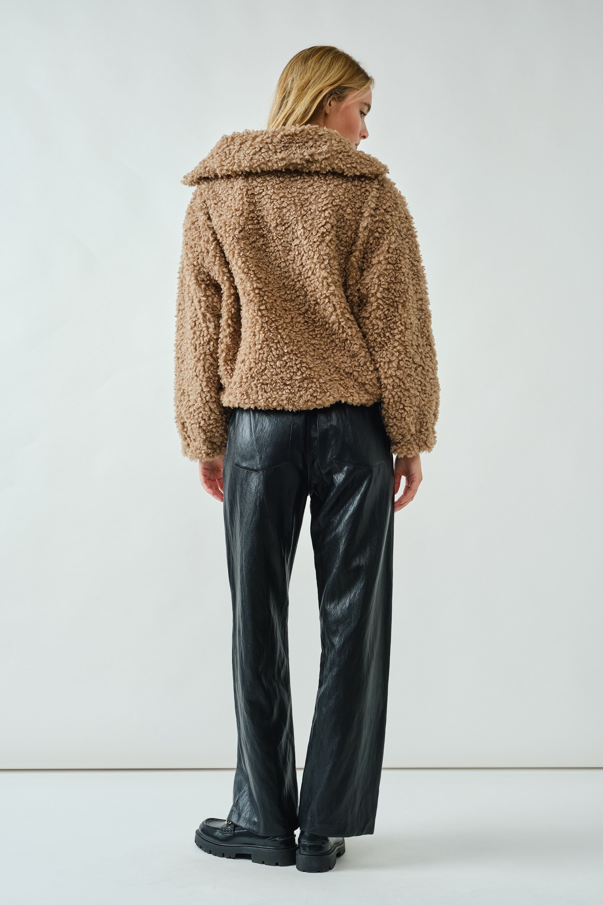 Back view of ultra soft half zip teddy jacket in taupe with relaxed silhouette