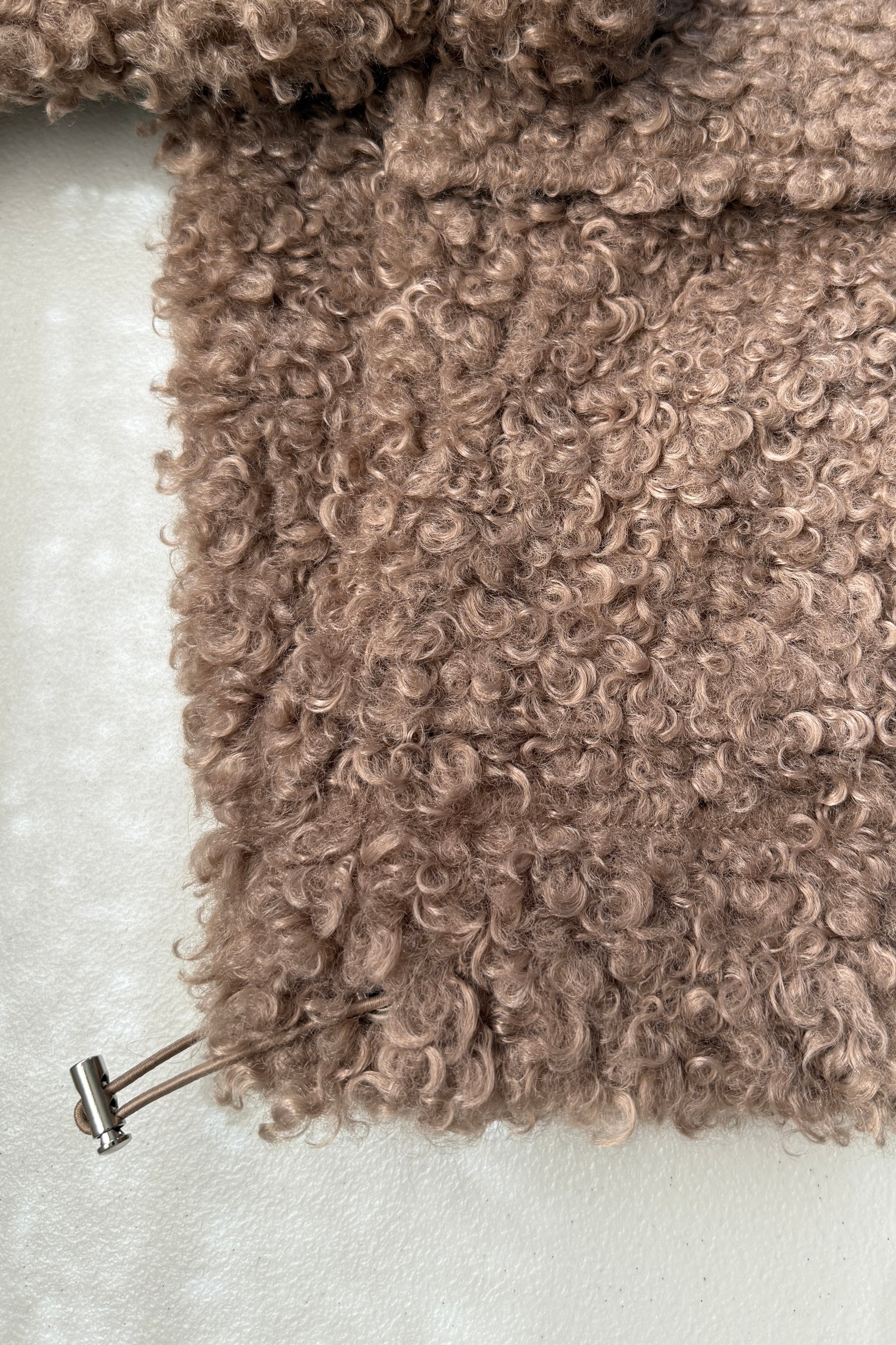 Adjustable drawstring hem detail on ultra soft half zip teddy jacket