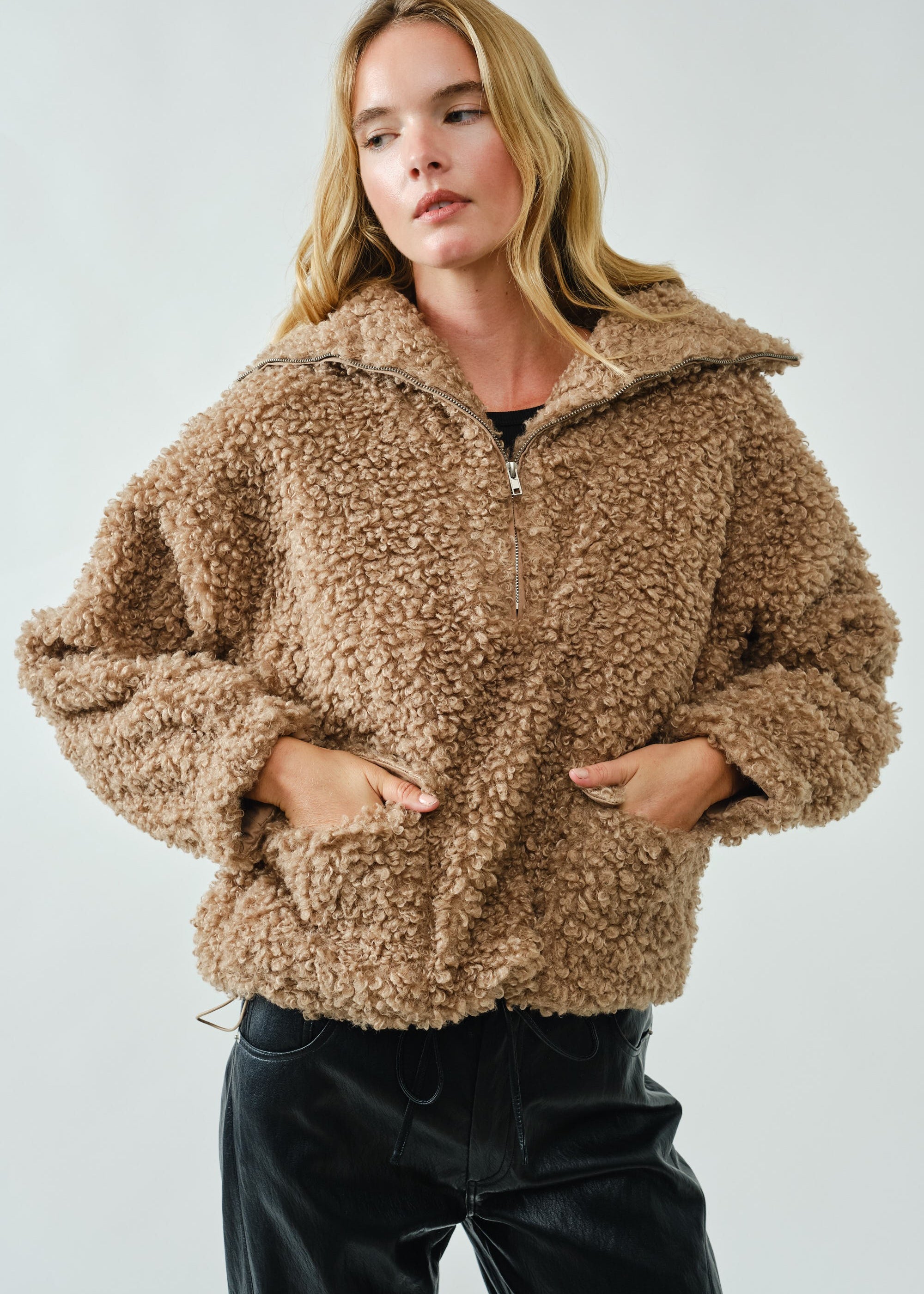 Front view of ultra soft half zip teddy jacket showing patch pockets in taupe