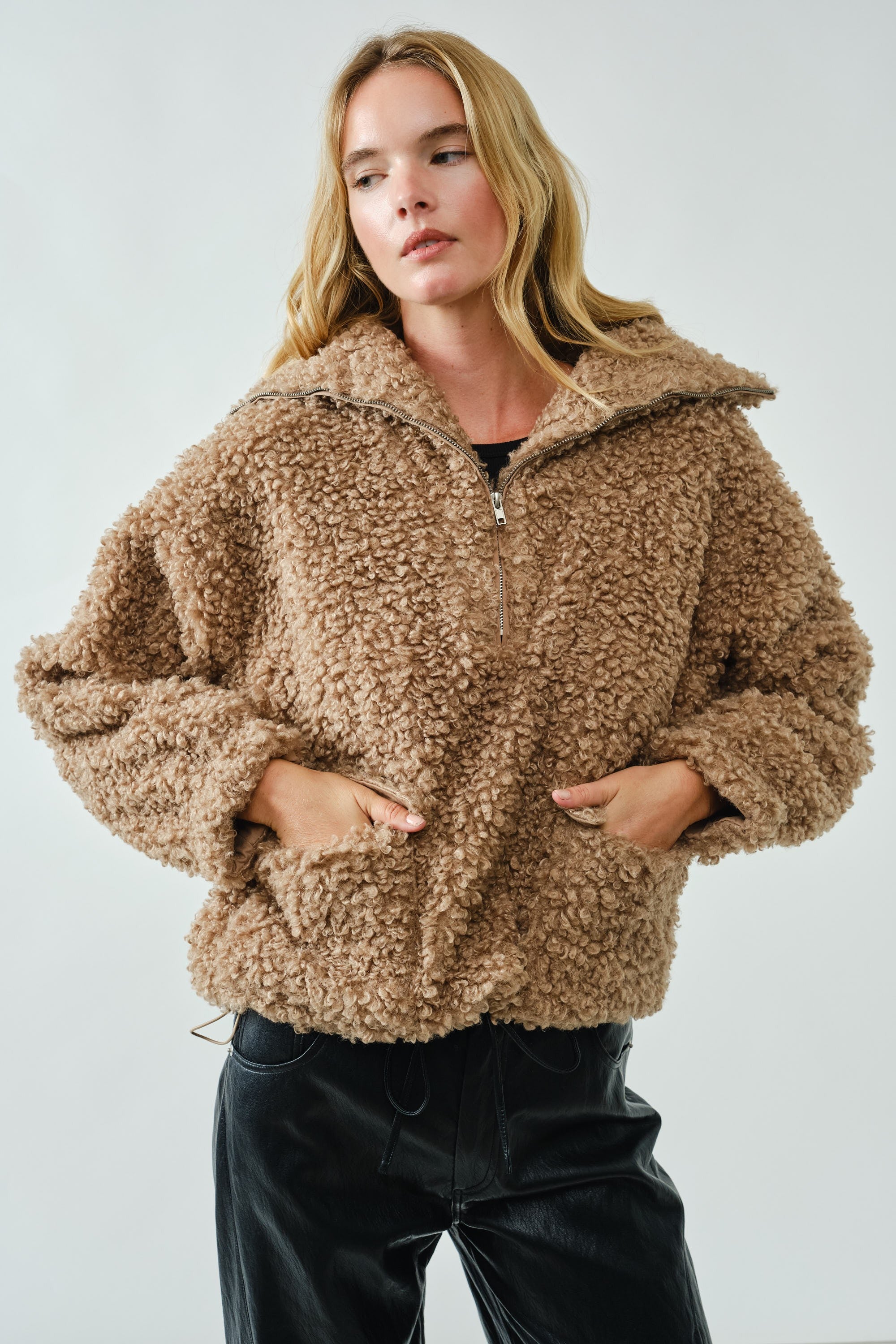 Front view of ultra soft half zip teddy jacket showing patch pockets in taupe