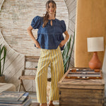 Full outfit with Venus Stripe Barrel Jeans in Yellow styled with a casual top and sandals for an easy everyday summer look.