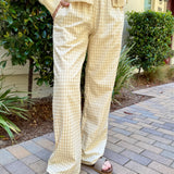 Front view of Wanderlust yellow (oatmeal) gingham boxer pants with wide-leg fit