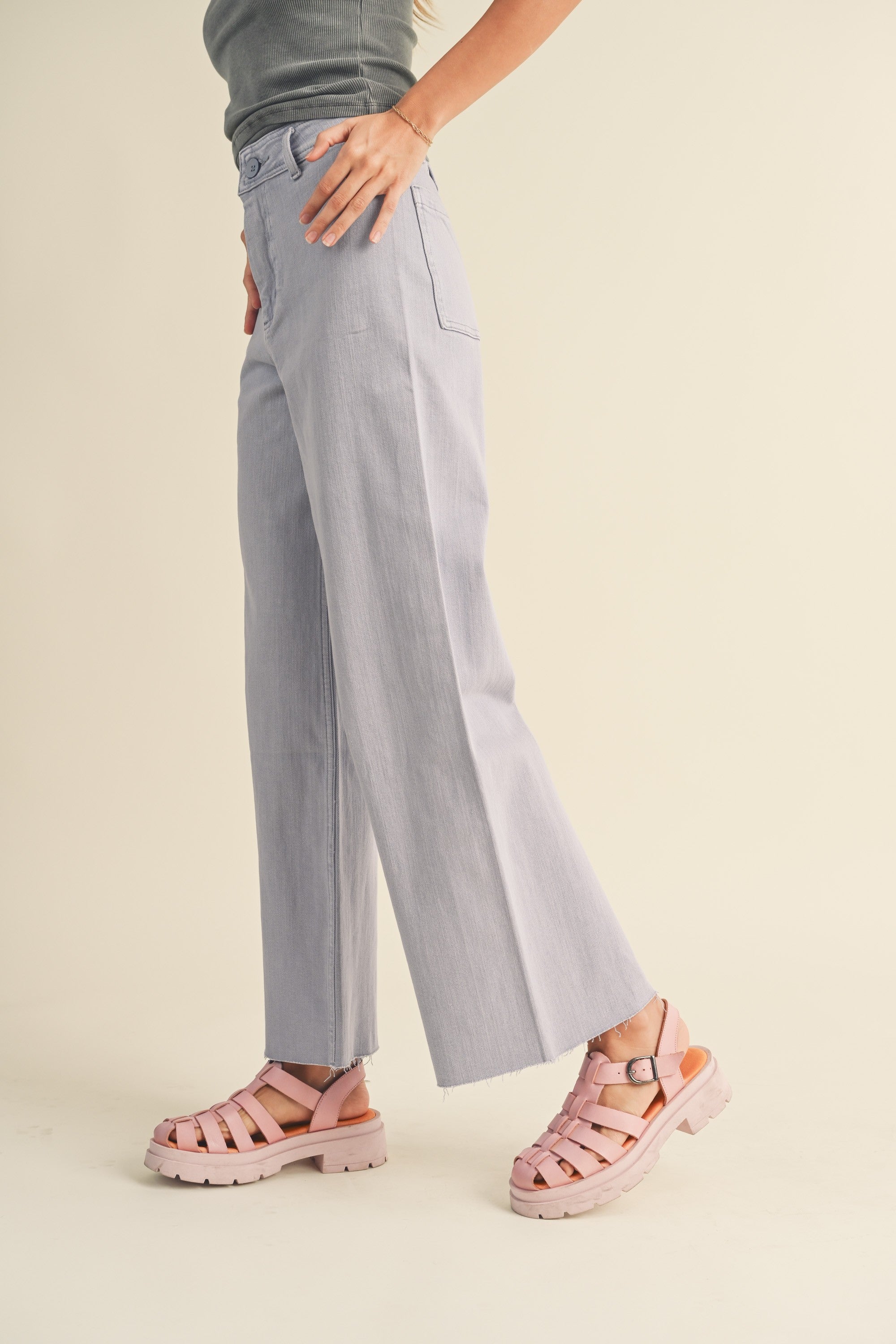 Side view of Wild Honey straight wide leg denim pants showing relaxed fit