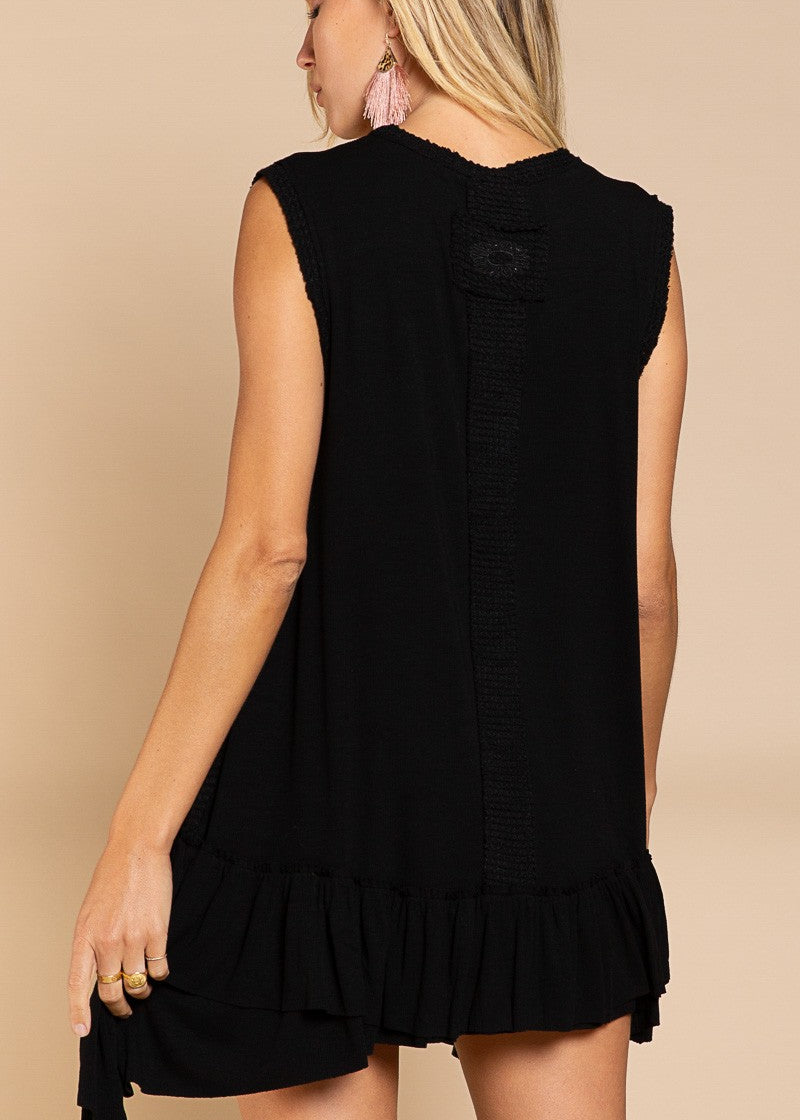 Back view of Wildest Rose tunic dress in black with sleeveless design