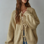 Woman modeling the Willow Boho Tie Cardigan (Sadie Tie Front Cardigan) in light taupe — boho knit cardigan styled for everyday wear.