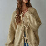 Woman modeling the Willow Boho Tie Cardigan (Sadie Tie Front Cardigan) in light taupe — boho knit cardigan styled for everyday wear.