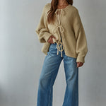 Full outfit view of the Willow Boho Tie Cardigan (Sadie Tie Front Cardigan) in light taupe — relaxed oversized fit with long sleeves.