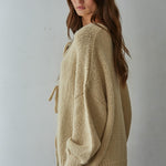 Side view of the Willow Boho Tie Cardigan (Sadie Tie Front Cardigan) in light taupe — relaxed oversized fit with long sleeves.
