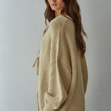 Side view of the Willow Boho Tie Cardigan (Sadie Tie Front Cardigan) in light taupe — relaxed oversized fit with long sleeves.