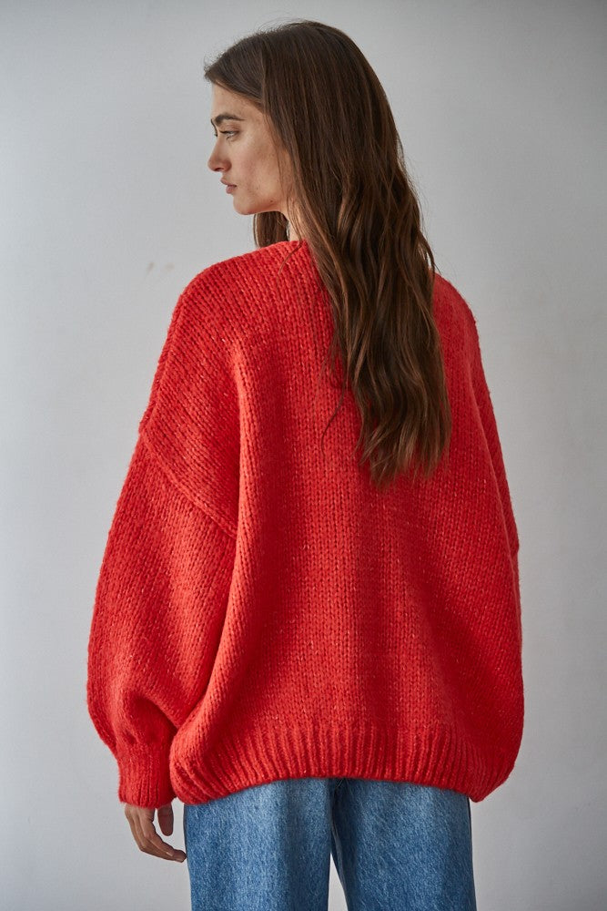Back of the Willow Boho Tie Cardigan (Sadie Tie Front Cardigan) in red — cozy knit fabric with a loose, draped silhouette