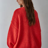 Back of the Willow Boho Tie Cardigan (Sadie Tie Front Cardigan) in red — cozy knit fabric with a loose, draped silhouette